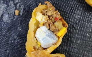 Fue con su hijo a llevar comida a un preso y hallaron droga en empanadas