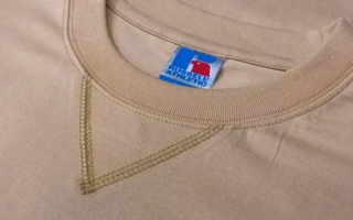 El secreto del triángulo en el cuello de los buzos: más que un adorno